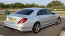 Rear three-quarter view of the silver Mercedes S 350 LWB