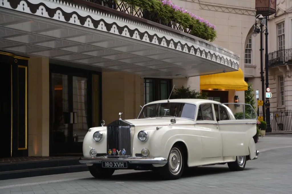 Classic Rolls-Royce Silver Cloud in front of the Dorchester Hotel in London