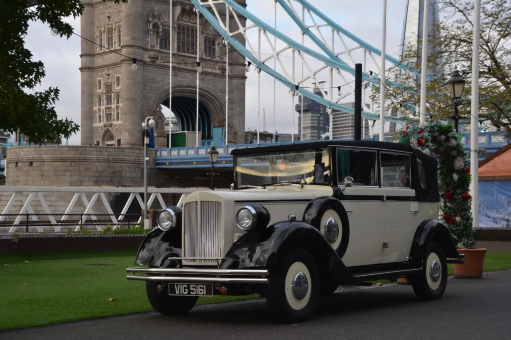 Vintage Regent in Black and Ivory with London Bridge in the Background