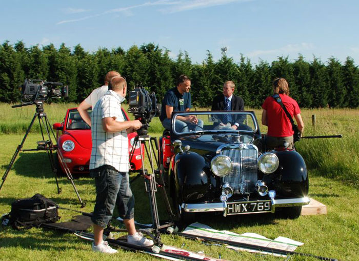 Black Triumph convertible on TV set of Bergerac