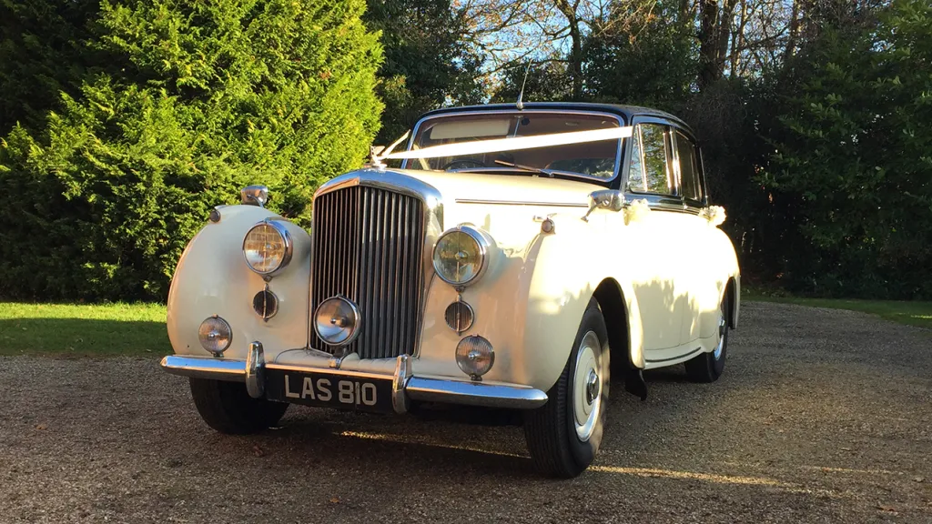 Classic Bentley R-Type with Ivory Wedding Ribbons across front bonnet.