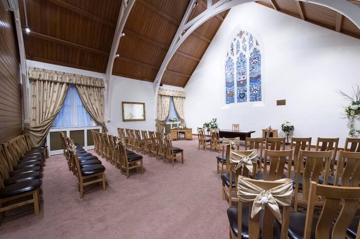 Jubilee Room at Southamption Registrar office set wih chairs and high vaulted ceiling.