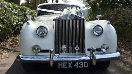 Front view Rolls-Royce Silver Cloud showing tall chrome grill and bumper