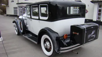Rear view of vintage Franklin with black picnic trunk