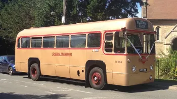 Vintage Single Decker bus parked in frotn of wedding church