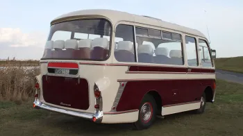 Rear view of classic single decker Bedford single Decker bus in cream and Burgundy