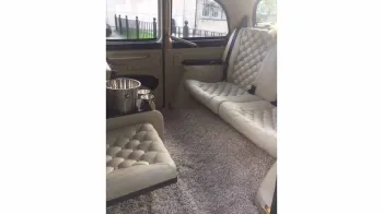 Rear cabing interior with crem leather seats and carpet
