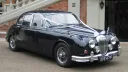 Front side view os classic Daimler 250 V8 with white ribbons