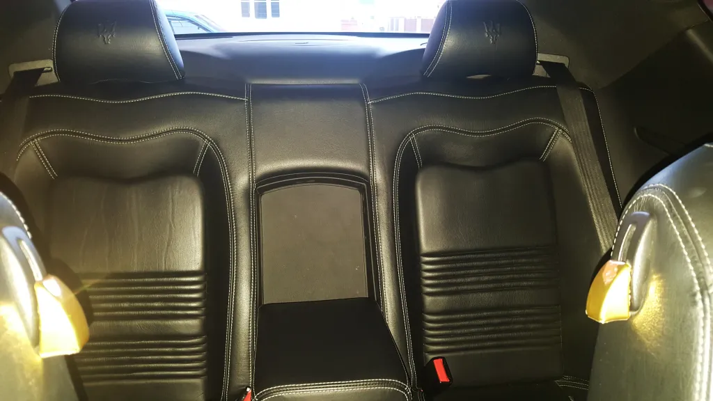 Black leather rear interior of a Maserati