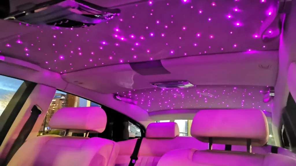 Rolls-Royce Phantom star light roof in pink inside a Rolls-Royce Phantom