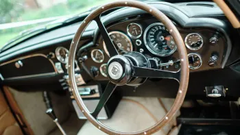 Steering wheel and dashboard inside Aston Martin DB6