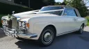 Left side view Rolls-Royce Corniche Convertible with roof close