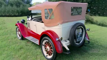 Rear Left had Side of Chevrolet with Beige Roof Closed