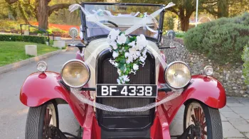Full front side view of Vintage Chevrolet with With Ribbons and Flowers