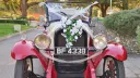 Full front side view of Vintage Chevrolet with With Ribbons and Flowers