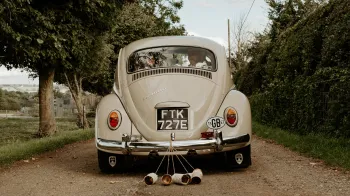 Classic Beetle Rear view with Tins and Cans Wedding Decoration