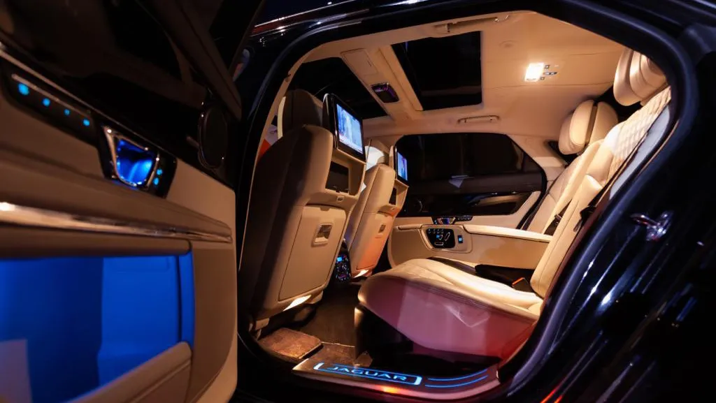 Rear searting area Interior photo of the Black Jaguar Top of the Range Jaguar XJ Autobiogrpahy  taken at night