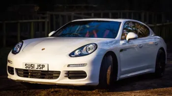 3/4 front view White Porsche Panamera S E-Hybrid