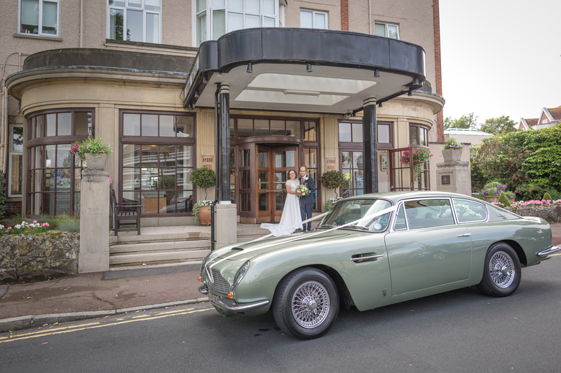 Adrian contacted us in advance of our big day, as promised, confirming the itinerary. On the day all timings were kept to, the car was perfectly presented & driven. Adrian was polite & appropriately attired for the occasion. Everything went smoothly & fulfilled expectations, & we were offered & accepted the experience of a little detour en-route to our reception venue. Thoroughly recommended! Sarah & David (the happy couple)