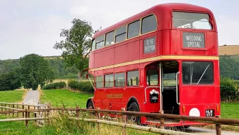 Double Decker Regent Bus open platform rear view iin the Buckinghamshire countryside