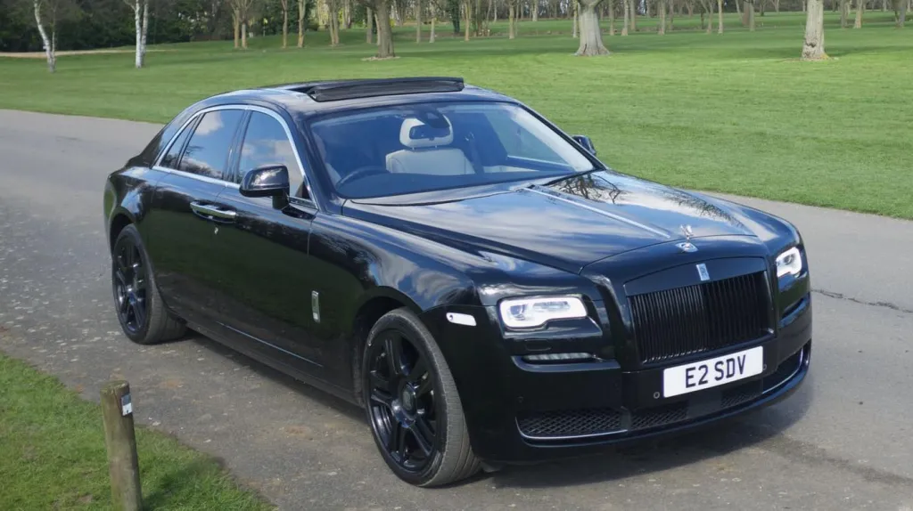 Front left view Rolls-Royce Ghost Series II in Black showing sunroof