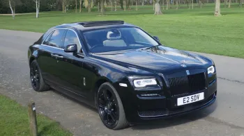 Front left view Rolls-Royce Ghost Series II in Black showing sunroof
