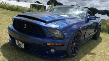 Ford Mustang Convertible Shebly V8 in Dark blue with Cobra logo on black front grill