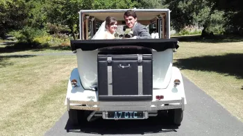 White imperial wedding car