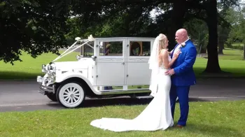 White imperial wedding car