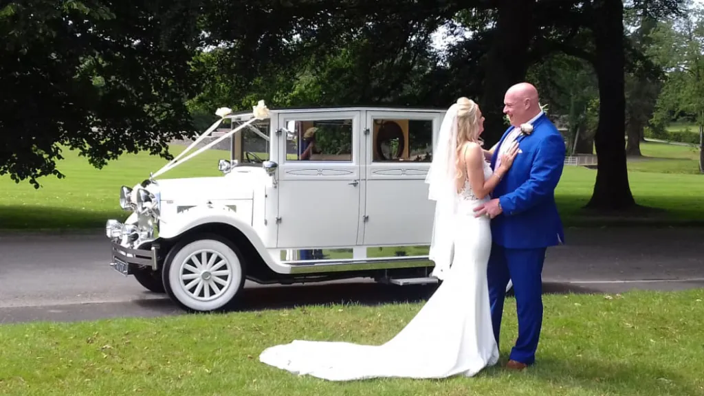White imperial wedding car