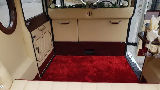 White imperial wedding car