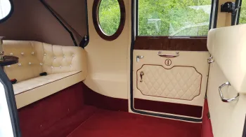 White imperial wedding car