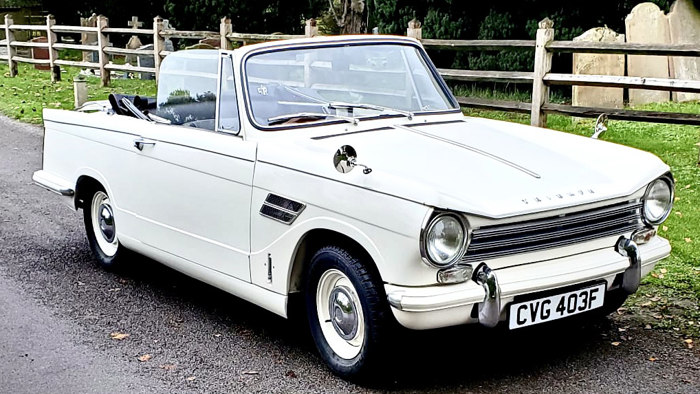 White Convertible Triumph