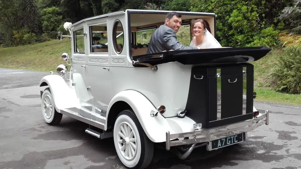 White imperial wedding car