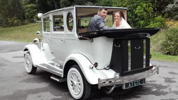 White imperial wedding car