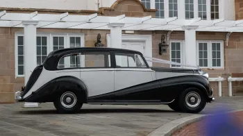 Side view of Classic Rolls-Royce silver Wraith LWB