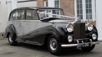 Rolls-Royce silver Wraith LWB with silver ribbons