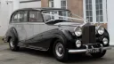 Rolls-Royce silver Wraith LWB with silver ribbons