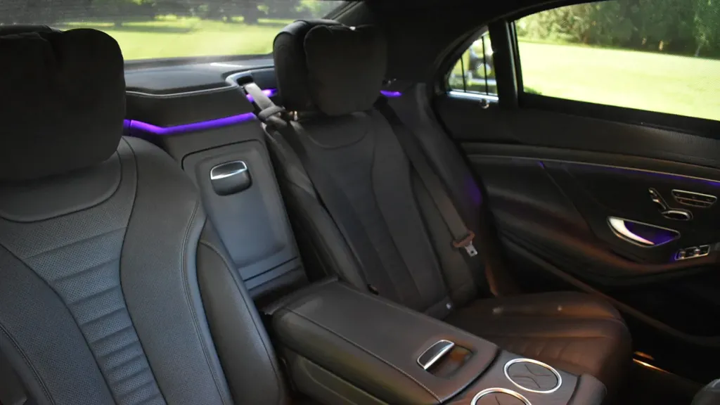 Mercedes S-Class rear black leather interior seats with purple illuminated LED lights