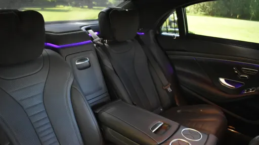 Mercedes S-Class rear black leather interior seats with purple illuminated LED lights