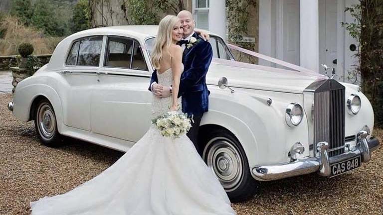 Although Oliver and Natalie will be writing to you separately upon returning from their honeymoon, my wife and I wanted to thank you in the meantime for the classic car hire arrangements for their wedding last Saturday. We made an excellent choice with the Rolls-Royce Silver Cloud ll (CAS 848) and Colin the chauffeur complemented it wonderfully. With many thanks once again, Best wishes, John &amp; Debbie D.