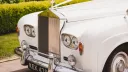 Rolls-Royce Silver Cloud front view of twin headlight and its tall chrome radiator