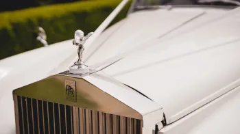 Spirit of ecstasy on top of the chrome radiator on a Rolls-Royce Silver Cloud I