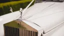 Spirit of ecstasy on top of the chrome radiator on a Rolls-Royce Silver Cloud I