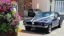 Ford Mustang Coupe decorated with wedding ribbons and bow