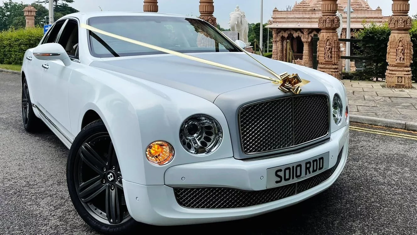 Modern Bentley Mulsanne in front of Asian Temple